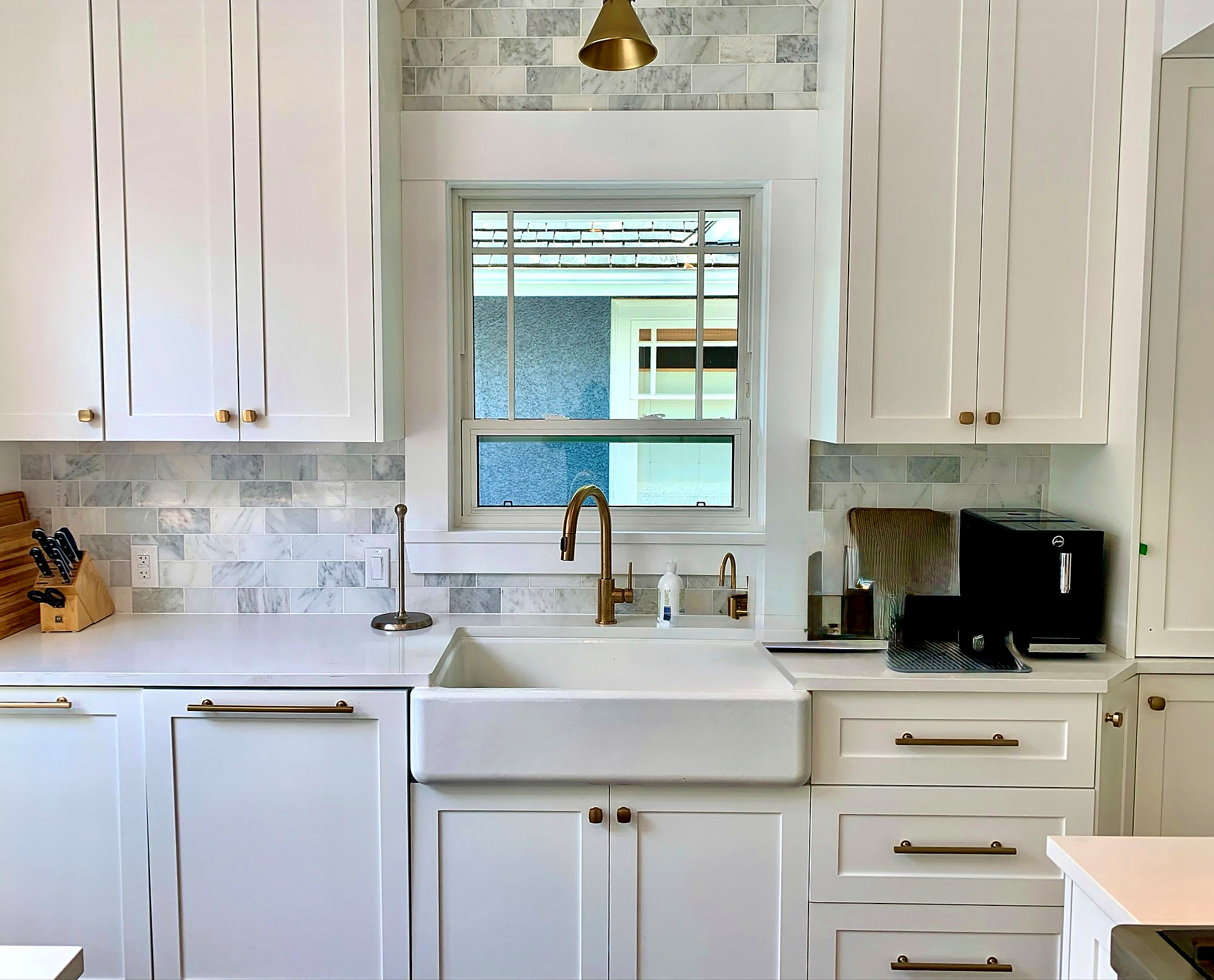 White kitchen with farmhouse sink